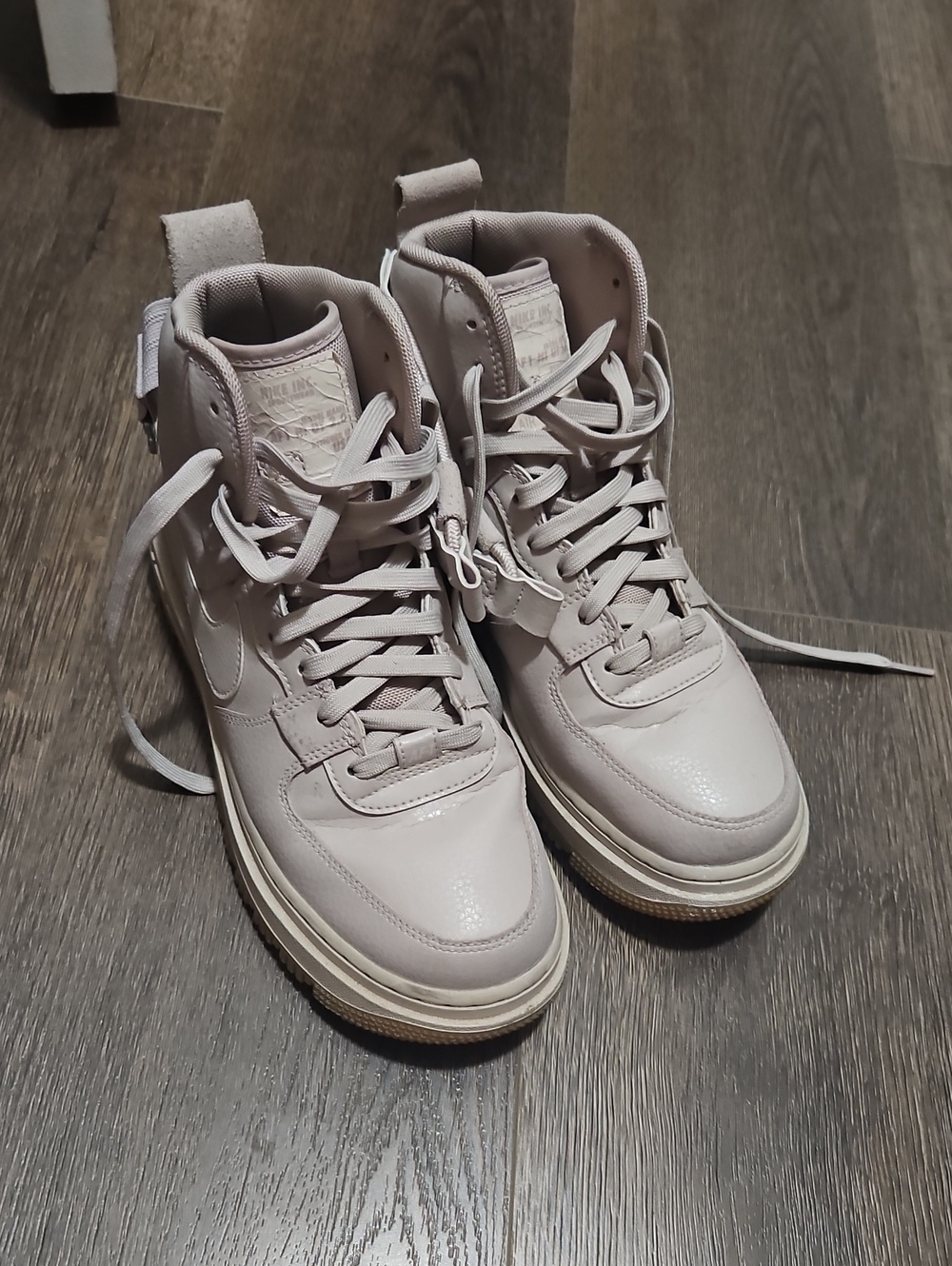 Nike Women's High-Top Sneakers in Pale Pink
